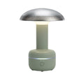 Lampe LED portable avec finition métallique et base en plastique vert